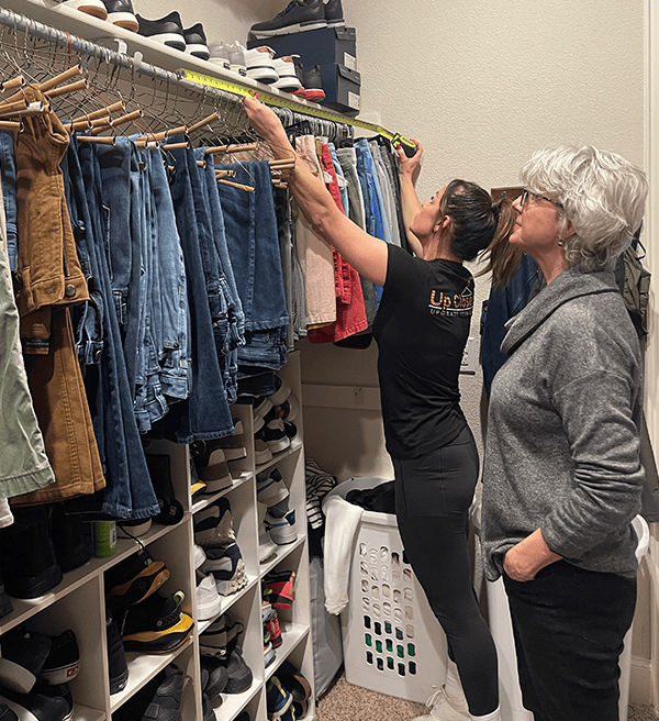 Designer measuring a closet